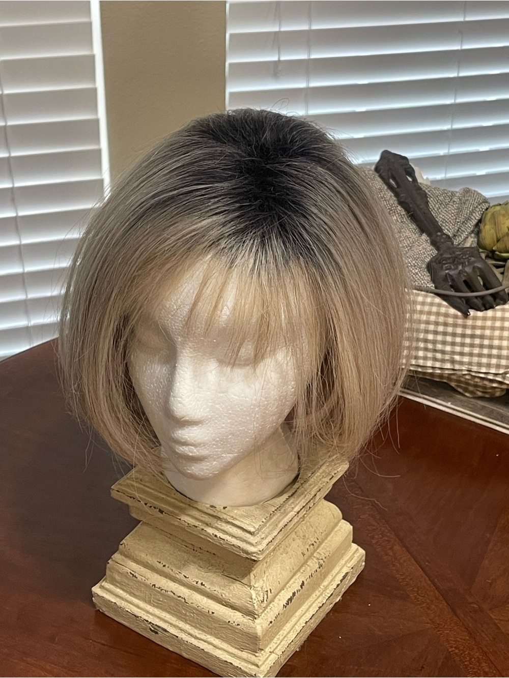 Rooted chin length Bob with Bangs